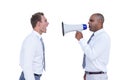 Businessman yelling with a megaphone at his colleague Royalty Free Stock Photo