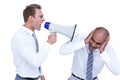 Businessman yelling with a megaphone at his colleague Royalty Free Stock Photo