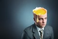 Businessman with yellow egg istead of head Royalty Free Stock Photo