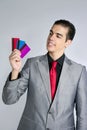 Businessman young with three credit cards Royalty Free Stock Photo