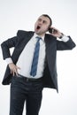Businessmand shouting on mobile phone