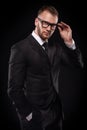 Businessmanman in black suit and glasses Royalty Free Stock Photo