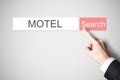 Businessmans finger pressing search button motel webbrowser Royalty Free Stock Photo