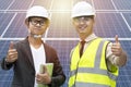 Businessmen agreed with the engineers lifting a thumb.Installation of solar panels