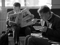 Businessmen in airport lounge while aiting for fllight, horizontal Royalty Free Stock Photo