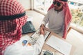 Businessmen arabian are signature contract agreement and handshake greeting together Royalty Free Stock Photo