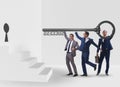 Businessmen in business success concept with key Royalty Free Stock Photo