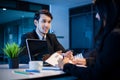 Businessmen and Businesswomen discussing documents for job interview concept