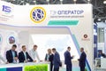 Businessmen communicate at the International exhibition of transport and logistics services
