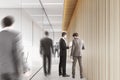 Businessmen in a company corridor