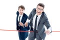 Businessmen cross the finish line Royalty Free Stock Photo