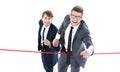 Businessmen cross the finish line Royalty Free Stock Photo