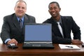 Businessmen at Desk with Laptop