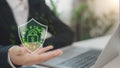 Businessmen with a digital shield and lock icon, representing mobile data protection and secure authentication. Cybersecurity and