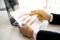 Businessmen are examining company financial information from documents prepared by the finance department Royalty Free Stock Photo