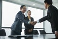 Businessmen Greeting Each Other with a Handshake