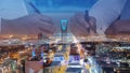 Businessmen hands signing documents on Riyadh skyline city scape background