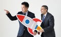 Businessmen holding a rocket icon