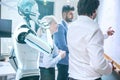 Businessmen with humanoid robot project development