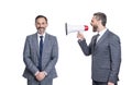 businessmen ignore shouting in megaphone in studio. businessmen ignore shouting in megaphone