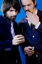 businessmen looking at phone Royalty Free Stock Photo