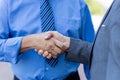 Businessmen making deal with handshake Royalty Free Stock Photo