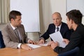 Businessmen in meeting at board room Royalty Free Stock Photo