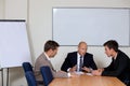 Businessmen in meeting at board room Royalty Free Stock Photo