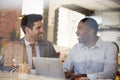 Businessmen Meeting In Coffee Shop Shot Through Window Royalty Free Stock Photo