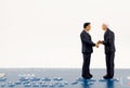 Businessmen miniatures agreeing Royalty Free Stock Photo