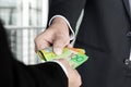 Businessmen passing money, Australia dollar banknotes Royalty Free Stock Photo
