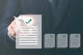 Businessmen review procedures through documents containing checkbox lists, rules of conduct concepts, rules and policies, company