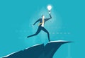 Businessmen running on top of the mountain and holding the light bulb up Royalty Free Stock Photo
