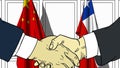 Businessmen or politicians shake hands against flags of China and Chile. Official meeting or cooperation related cartoon