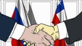 Businessmen or politicians shake hands against flags of Russia and Chile. Official meeting or cooperation related