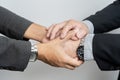 Businessmen shake hands, end of meeting, business concept. Two happy businessman handshake over the desk during meeting Royalty Free Stock Photo