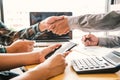 Businessmen shake hands with successful partners and congratulate Royalty Free Stock Photo