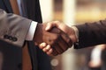 Men in suits make an agreement. Businessmen shaking hands with each other. Concept: conclusion of a deal, investment agreement. Royalty Free Stock Photo