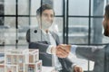 TWO BUSINESSMEN WHO HAVE REACHED AN AGREEMENT Royalty Free Stock Photo