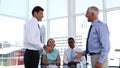 Businessmen shaking hands in the meeting room