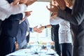 Businessmen shaking hands in office Royalty Free Stock Photo