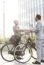 Businessmen shaking hands outside office building Royalty Free Stock Photo