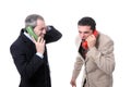 Businessmen shouting on the phone