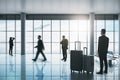 Businessmen and suitcases in luxury airport interior with panoramic city view and sunlight. Travel concept Royalty Free Stock Photo