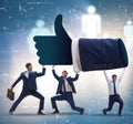 Businessmen supporting thumbs up gesture Royalty Free Stock Photo