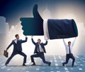 Businessmen supporting thumbs up gesture Royalty Free Stock Photo