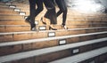 Businessmen team group Walking down the stairs together in the downtown Royalty Free Stock Photo