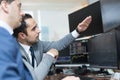 Stock brokers looking at computer screens, trading online. Royalty Free Stock Photo