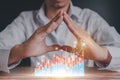 Businessmen use a handle on the wooden block to show stock graphs and rising stock signals with chart indicators. Concepts of
