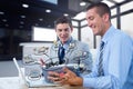 Businessmen using technologies with text and icons in foreground Royalty Free Stock Photo